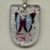 Pendentif demi rond papillon