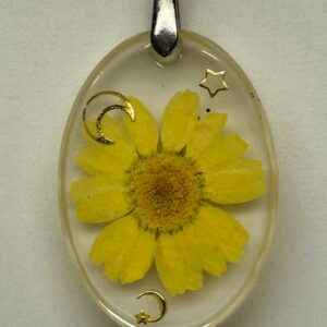 Pendentif ovale transparent avec fleur jaune fluorescent