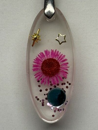 Pendentif oblongue fleur