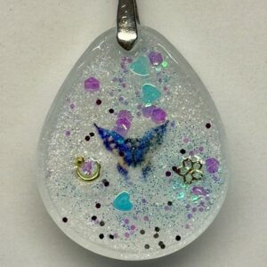 Pendentif ovale papillon bleu