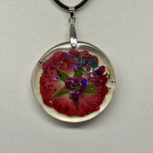 Pendentif rond motif fleur