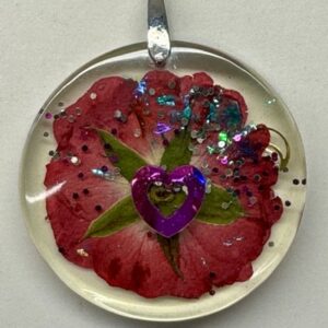 Pendentif rond motif fleur