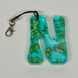 Porte clef vert paillettes or lettre N